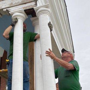 Master Craftsmen at The Honey Do Service, fitting hand-crafted replacement pillars to the historic EW King House in Bristol, Tennessee